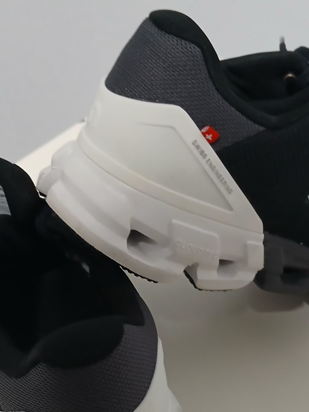 On Running Women's Black and White CloudFlyer Sneakers.